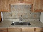 Backsplash with Decorative Insert and Pencil Liner