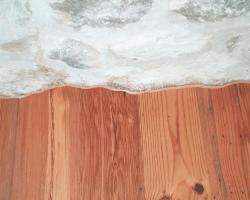 Hardwood Cut Tight to Rock Wall